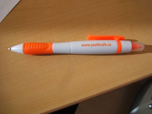 Orange and white coloured pen