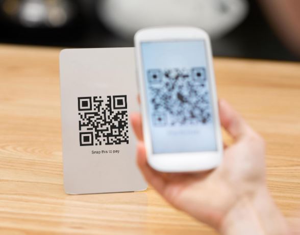 Cell reading QR Code to download an app 